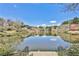 Breathtaking lake view, complete with lush greenery, steps and an iron railing at 68 Hampshire Ct, Avondale Estates, GA 30002