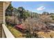 Scenic community view showcasing mature trees and colorful landscaping in bloom at 68 Hampshire Ct, Avondale Estates, GA 30002