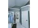 Well-lit bathroom features a glass-enclosed shower and neutral decor at 2669 Ambria Dr, Buford, GA 30519