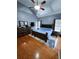 Spacious bedroom with hardwood floors, a ceiling fan, and a large bed frame at 2669 Ambria Dr, Buford, GA 30519