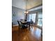 Dining room featuring a modern chandelier and wooden table with six chairs at 2669 Ambria Dr, Buford, GA 30519