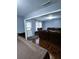 Cozy living room featuring hardwood floors and comfortable brown leather seating at 2669 Ambria Dr, Buford, GA 30519