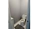 This powder room features tile floors, a white toilet, and a white vanity at 2669 Ambria Dr, Buford, GA 30519