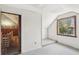 Attic space with carpet floor and view into the hallway at 28 Exeter Rd, Avondale Estates, GA 30002