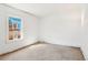 Empty bedroom featuring white walls and a window allowing natural light at 28 Exeter Rd, Avondale Estates, GA 30002