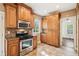 Cozy kitchen featuring stainless steel appliances, tiled backsplash, and a convenient layout for cooking at 28 Exeter Rd, Avondale Estates, GA 30002