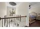 Hallway features decorative ceiling, hardwood floors, and view of the bedroom at 2875 Waterstone Dr, Cumming, GA 30041