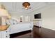 Lovely bedroom with hardwood floors, trey ceiling, and ensuite bathroom at 2875 Waterstone Dr, Cumming, GA 30041