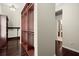 Walk-in closet featuring shelving and dark hardwood floors, offering ample storage at 2875 Waterstone Dr, Cumming, GA 30041