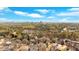 Panoramic view of a residential area with well-maintained homes and lush trees under a cloudy sky and city skyline at 3509 Ivy Manor Se Rd, Smyrna, GA 30080