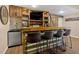 Finished basement featuring a custom bar and sliding barn door at 3509 Ivy Manor Se Rd, Smyrna, GA 30080