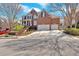Elegant brick home featuring a two-car garage, manicured landscaping, and a welcoming entrance at 3509 Ivy Manor Se Rd, Smyrna, GA 30080