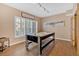 Game room features natural lighting and an air hockey table at 3509 Ivy Manor Se Rd, Smyrna, GA 30080