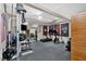 Spacious home gym with weights, machines, and motivational flags at 3509 Ivy Manor Se Rd, Smyrna, GA 30080