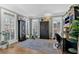 Home office featuring built-in shelves, natural light, plantation shutters, and ample workspace at 3509 Ivy Manor Se Rd, Smyrna, GA 30080