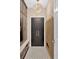 Stylish mudroom featuring custom cabinets, decorative tile floor, and designer lighting at 3509 Ivy Manor Se Rd, Smyrna, GA 30080