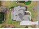 Aerial view of the home showcasing its well-maintained roof and outdoor entertainment space at 1060 Meadow Brook Dr, Woodstock, GA 30188