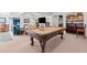 Spacious basement area featuring a billiard table, wet bar, and entertainment space for relaxing and having fun at 1060 Meadow Brook Dr, Woodstock, GA 30188
