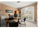 Well-lit home office featuring a large window and functional workspace at 1060 Meadow Brook Dr, Woodstock, GA 30188