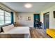 Relaxing bedroom featuring a queen bed, desk, and stylish decor at 1714 Highland Pl, Decatur, GA 30035