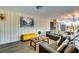 Cozy living room with wood-look floors, neutral-toned furniture, and stylish decor at 1714 Highland Pl, Decatur, GA 30035