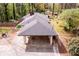Aerial view of the home's backyard, patio, and a glimpse of its roof at 1714 Highland Pl, Decatur, GA 30035