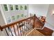 High angle view of the living room from the second floor, showing hardwood floors and natural light at 5101 Barrington Trace Dr, Atlanta, GA 30331