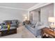 Cozy living room featuring neutral decor, comfortable sofas, and stylish coffee table at 5101 Barrington Trace Dr, Atlanta, GA 30331