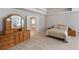 Spacious main bedroom with ensuite bathroom, neutral walls, carpet flooring, and lots of storage at 5101 Barrington Trace Dr, Atlanta, GA 30331