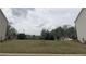 Grassy lot featuring young trees at 1282 Ainsworth Aly, Sugar Hill, GA 30518