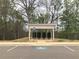 Community mailboxes with covered shelter and accessible parking at 1282 Ainsworth Aly, Sugar Hill, GA 30518