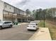 Street view of townhomes with street parking at 1282 Ainsworth Aly, Sugar Hill, GA 30518