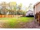 Expansive backyard with a full fence and lush green grass at 20 Riverbrooke Rd, Covington, GA 30016