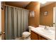 Bathroom features a shower with curtain, vanity, and fixtures at 20 Riverbrooke Rd, Covington, GA 30016