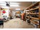 Spacious garage with shelving and storage, ideal for projects at 20 Riverbrooke Rd, Covington, GA 30016