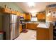 Functional kitchen with stainless steel appliances, light-colored countertops, and ample cabinet space at 20 Riverbrooke Rd, Covington, GA 30016