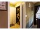 Laundry room with stackable washer and dryer for convenient laundry at 20 Riverbrooke Rd, Covington, GA 30016