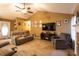 Spacious living room with vaulted ceilings, modern decor, and cozy seating arrangements at 20 Riverbrooke Rd, Covington, GA 30016