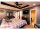 Spacious main bedroom with modern decor, en-suite bathroom, and plenty of natural light at 20 Riverbrooke Rd, Covington, GA 30016