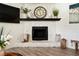 Stylish stone fireplace with mantel, perfect for a cozy living space at 320 Creek Side Ct, Mcdonough, GA 30252
