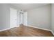 Bright bedroom with hardwood floors, a neutral color scheme, and ample closet space at 508 Cumberland Se Ct, Smyrna, GA 30080