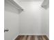 Walk-in closet with custom flooring and shelving at 508 Cumberland Se Ct, Smyrna, GA 30080