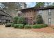 Charming home featuring a balcony and mature landscaping at 508 Cumberland Se Ct, Smyrna, GA 30080