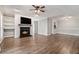 Cozy living room with hardwood floors, fireplace, and open layout, perfect for entertaining at 508 Cumberland Se Ct, Smyrna, GA 30080