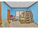 Bright storage room with boxes and a ladder at 2701 East Mill Sw Way, Conyers, GA 30094