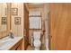 Modest bathroom with wallpaper and decor at 2701 East Mill Sw Way, Conyers, GA 30094