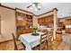 Dining room with tile floors, built-in china cabinet and a bright sunny view to the kitchen at 2701 East Mill Sw Way, Conyers, GA 30094