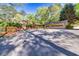 Front exterior of property with mature foliage and a detached garage at 2701 East Mill Sw Way, Conyers, GA 30094