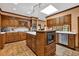 Large kitchen features custom cabinets, an island with a sink, and a bright skylight at 2701 East Mill Sw Way, Conyers, GA 30094
