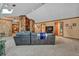 Bright and open living space with a stone fireplace and ample natural light at 2701 East Mill Sw Way, Conyers, GA 30094